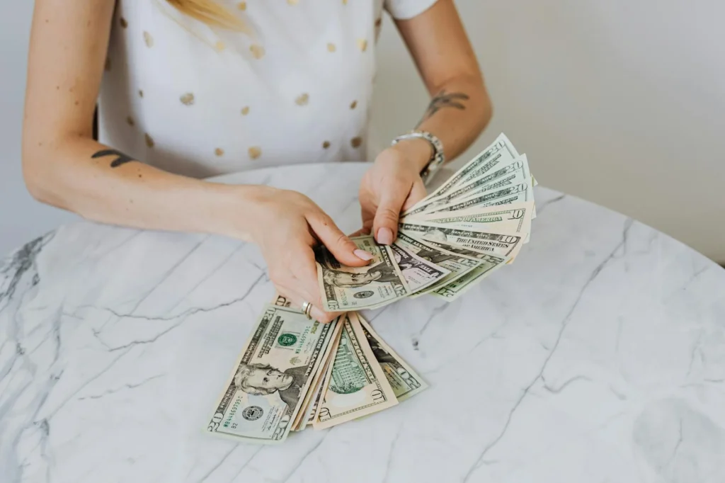 How much do you have to earn to pay back student loan